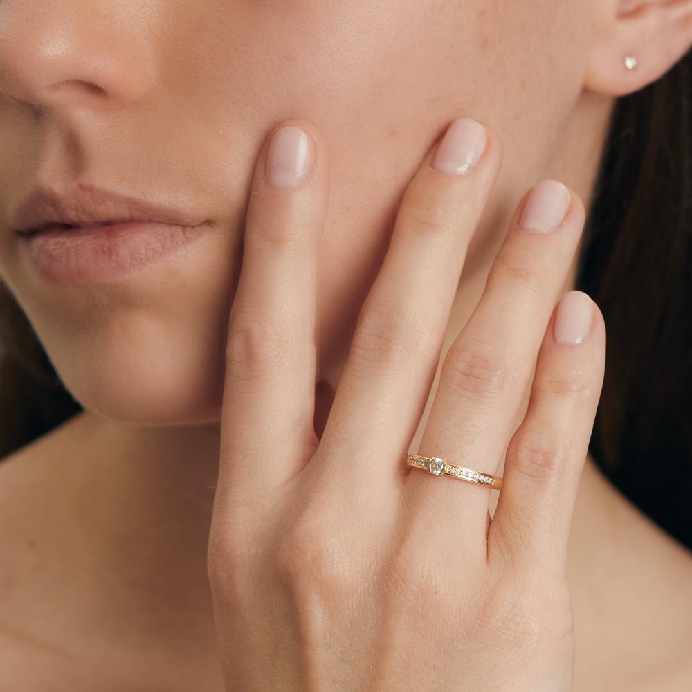 Solitärring 750/18 K gult guld diamant 0.20 ct, 17 stenar, w-si