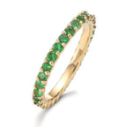 Minnesring 750/18 K gult guld granat grön, 1.20 ct, 30 stenar