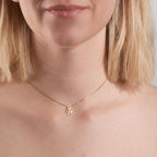 Hängsmycke 750/18 K gult guld diamant 0.007 ct, w-si ängel