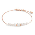 Armband 750/18 K rött guld Sötvattensodlad pärla, 9 Pärlor 15-18 cm