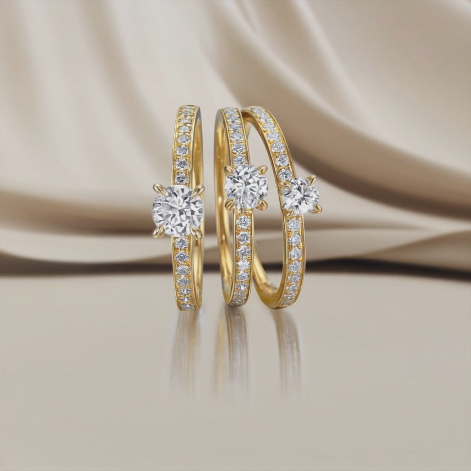 Solitärring 750/18 K gult guld diamant 0.34 ct, 17 stenar, w-si